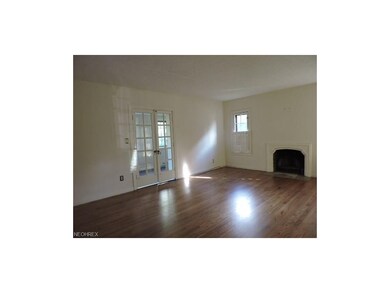 AFTER: BEAUTIFULLY REFINISHED FLOORS IN LIVING ROO