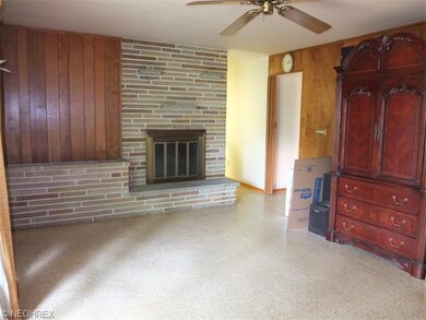 Another view of the family room with fireplace.