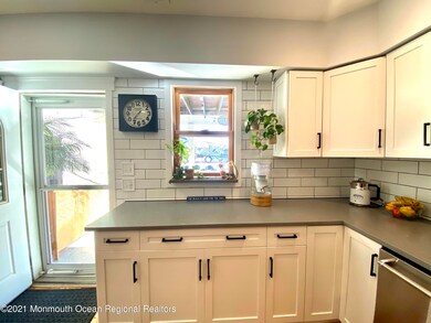 Kitchen Angle W/ Balcony View