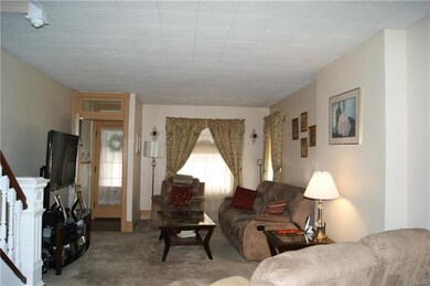 Notice the foyer details as you enter a spacious L