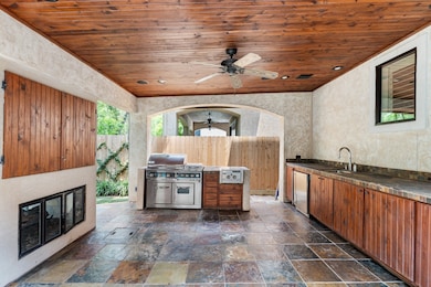 Incredible covered outdoor kitchen fully equipped