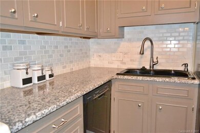Take note of the detail in the back splash and cou
