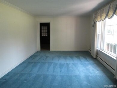 Living Room. Hardwood floor under carpet.