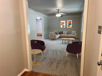 Virtually Staged formal living area.