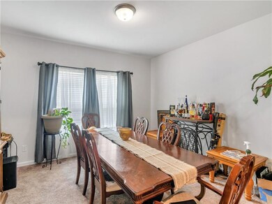 View of carpeted dining space
