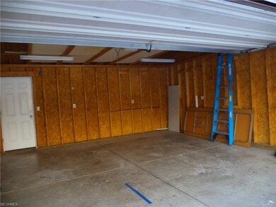 Large, attached 2 car garage. Has access to the ba