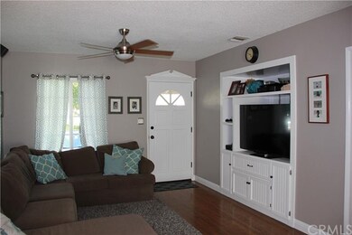 Warm and inviting living room with hardwoood floor