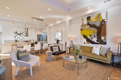 The upper level living/dining area with dramatic c