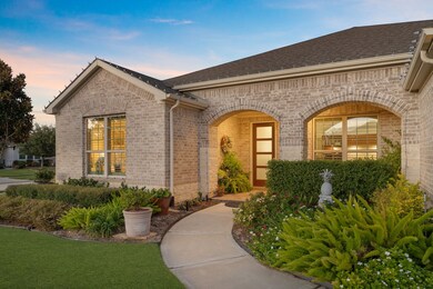 A corner-lot gem with landscaping that hugs every angle—true curb appeal that pops. The perfect north/south orientation brings soft morning and dreamy afternoon light to the façade. Sun-kissed yard framed by mature plantings for a quiet retreat.