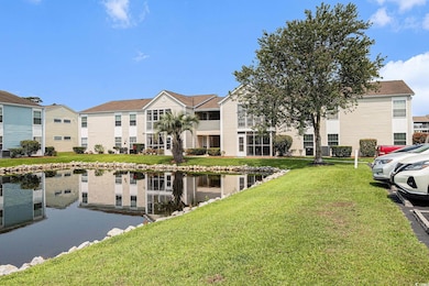 Water view featuring nearby suburban area