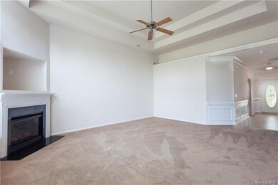 View of Family Room with Double tray ceiling