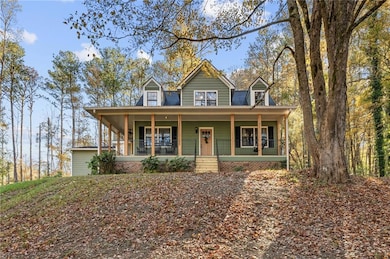 Farmhouse featuring a porch