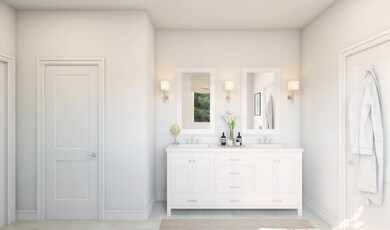 Primary bath featuring freestanding vanity with dual sinks