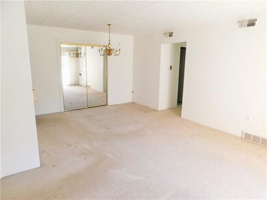 Dining Room With Large Mirrored Door Storage Close