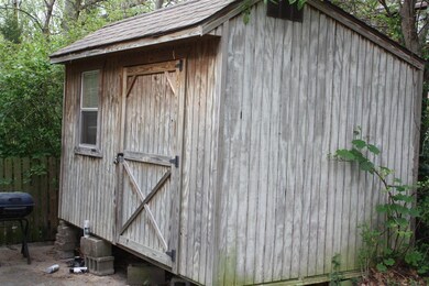 Yard barn on 1710 side. Can go or stay