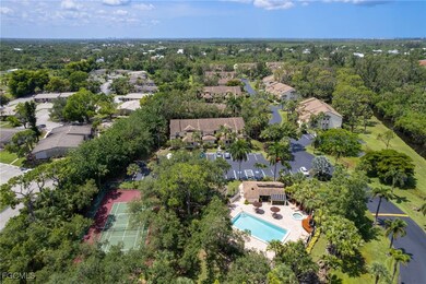 Aerial perspective of suburban area with a pool