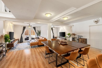Dining area featuring a ceiling fan, french doors,
