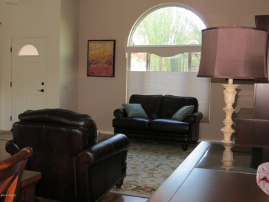 living area and front door entry