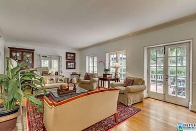 Filled with natural light and opening to sunroom