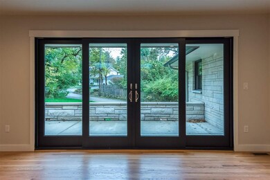 The large patio doors offer a view from the Great 