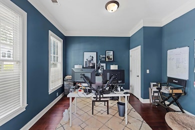 Office area with plenty of natural light, wood fin