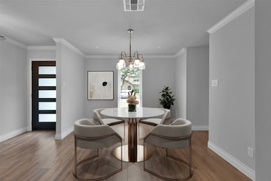 Formal dining room with plenty of space to host fa