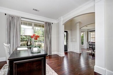 Great Office with Crown Moulding and Arched Entryw