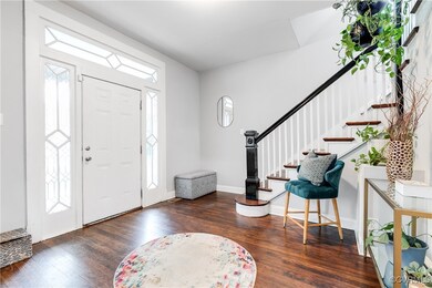 Entryway featuring dark hardwood / wood-style floo