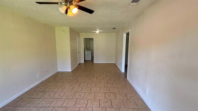 Unfurnished room with a textured ceiling, ceiling