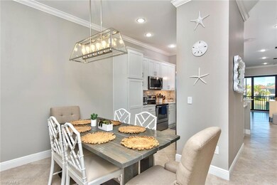 Dining area with upgraded light fixture & access t