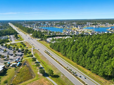 View of property location with a nearby body of water