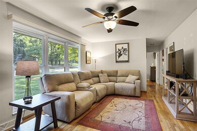 Natural light seamlessly flows into the living room.