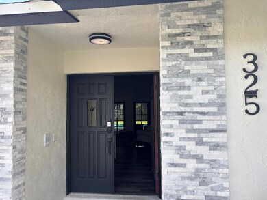 325 Knotty Wood Ln, Wellington, FL 33414 - photo 2