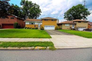 The spacious driveway is large enough for at least