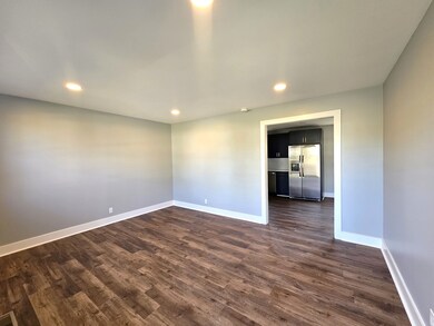 Inviting front room with recessed lighting.