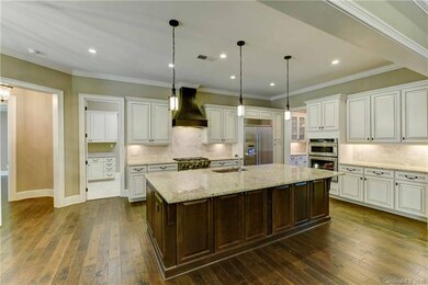 The incredible kitchen includes an over-sized gran