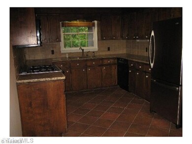 Kitchen. Tile Floor and Granite Counters
