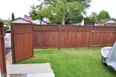 Front Yard Fenced with gate entry