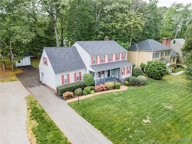 Aerial front, driveway and yard