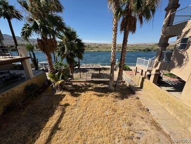 View of yard with a water view