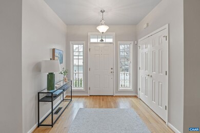 Wood flooring runs throughout main living areas an