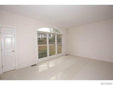 The open floor plan allows for flexible use of roo