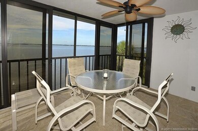 screened balcony with impact glass protection
