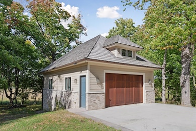 Four-car heated, detached garage.