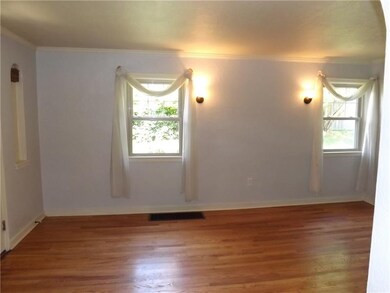 Living room has plenty of natural light view from 