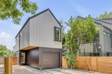 Modern home with a garage, board and batten sidin