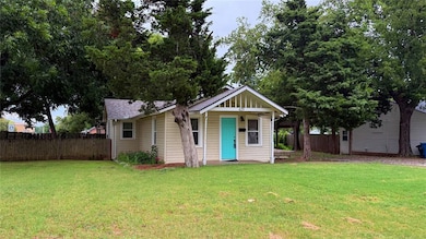 Bungalow-style home with roof with shingles