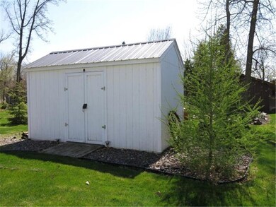 8x16 storage shed with new metal roof.