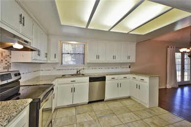 KITCHEN WITH LOTS OF COUNTER SPACE AND CABINETS