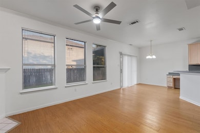 Living Room with plenty of windows for natural light. 